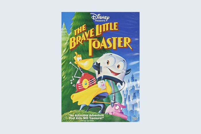 Animated toaster smiles, leads group of lively appliances through forest towards city; text reads 