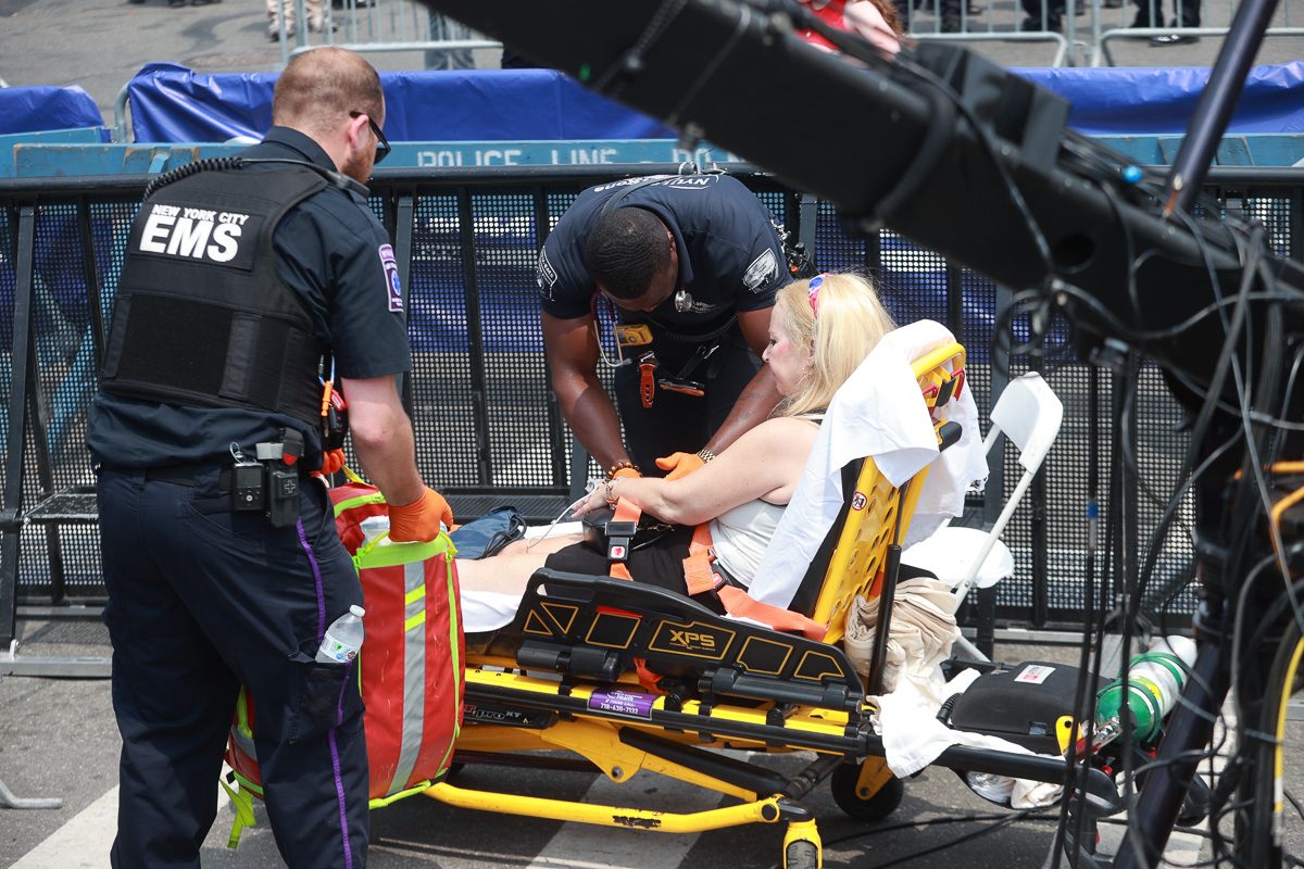 woman receiving first aid at an eating contest